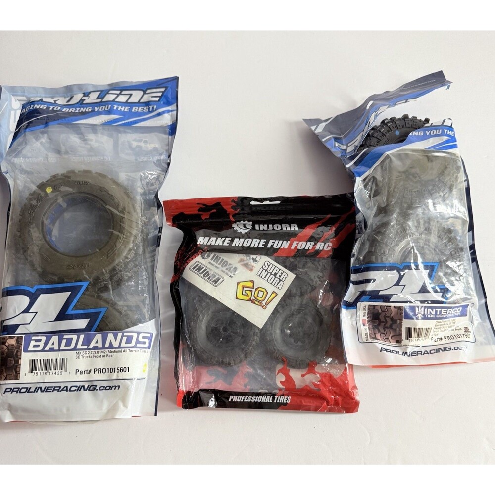 Lot Of RC Pro Line BadlandsBelted Truck Mounted Tires And Injora